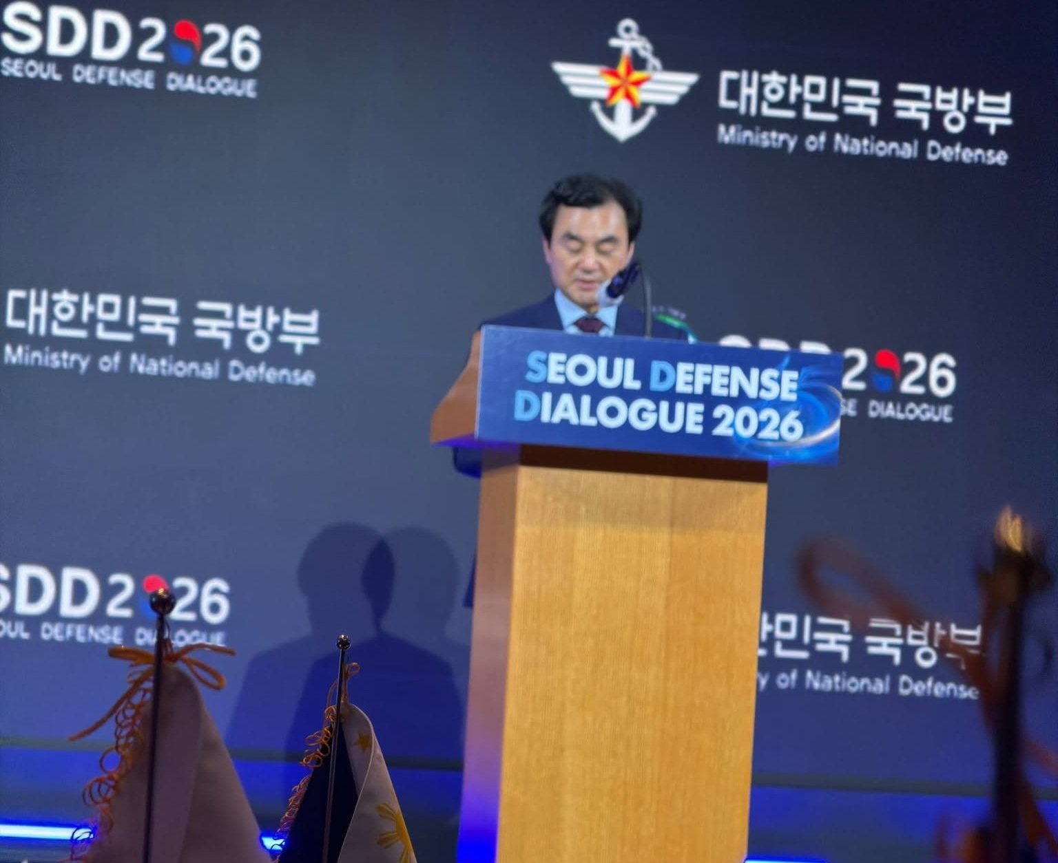 Minister of National Defense delivering opening remarks at the Seoul Defense Dialogue 2026 podium
