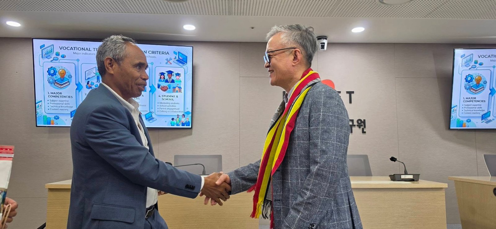 Diplomatic handshake between H.E. Domingos Lemos and KRIVET leadership
